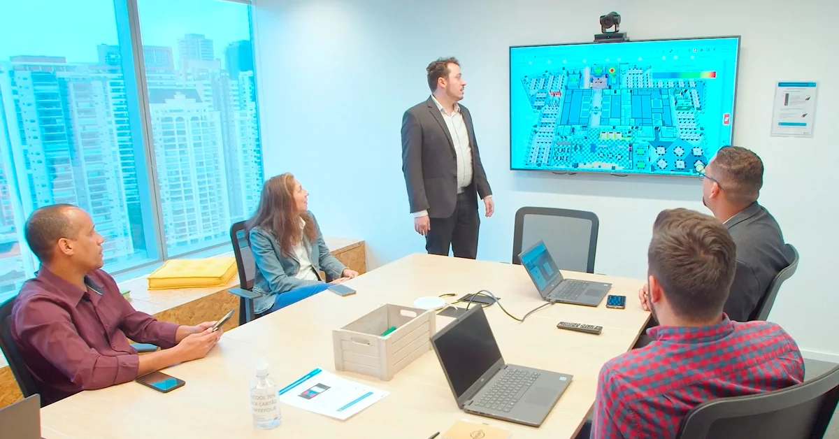 Employees in meeting room