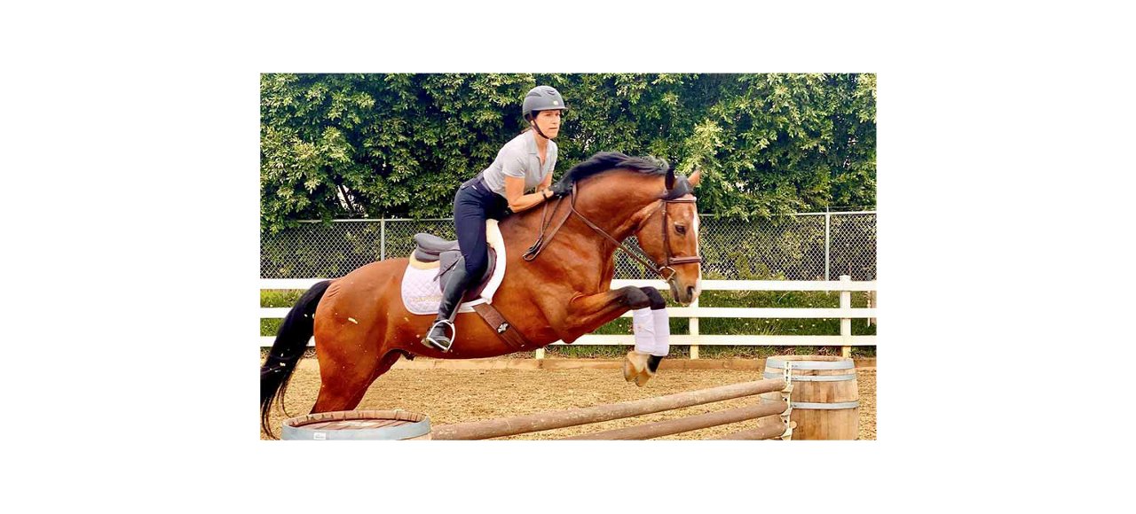 Kris smith riding on a horse