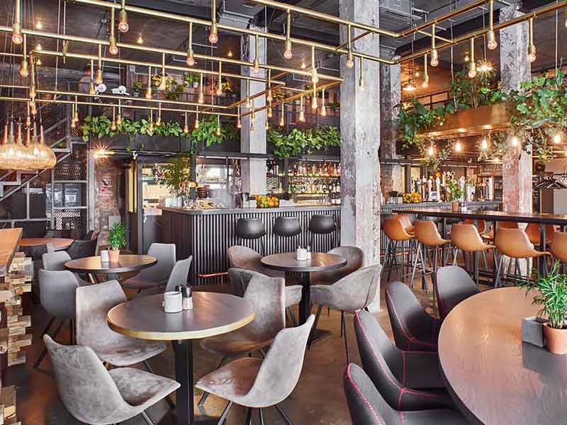 Rustic looking café with greenary