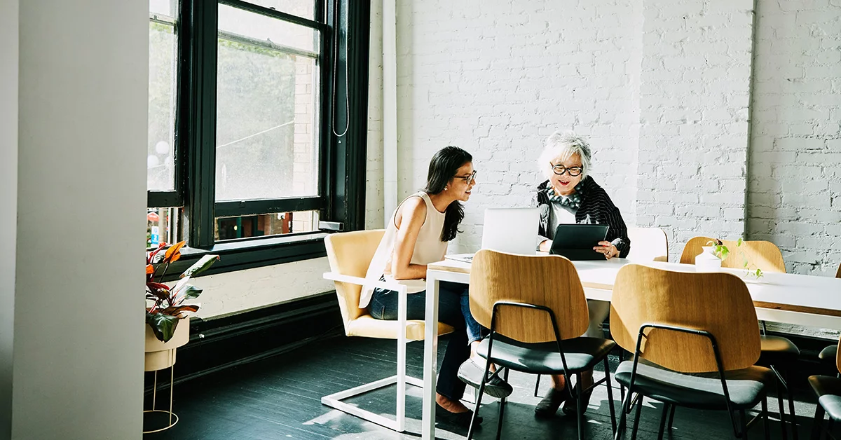 Two ladies discussing something