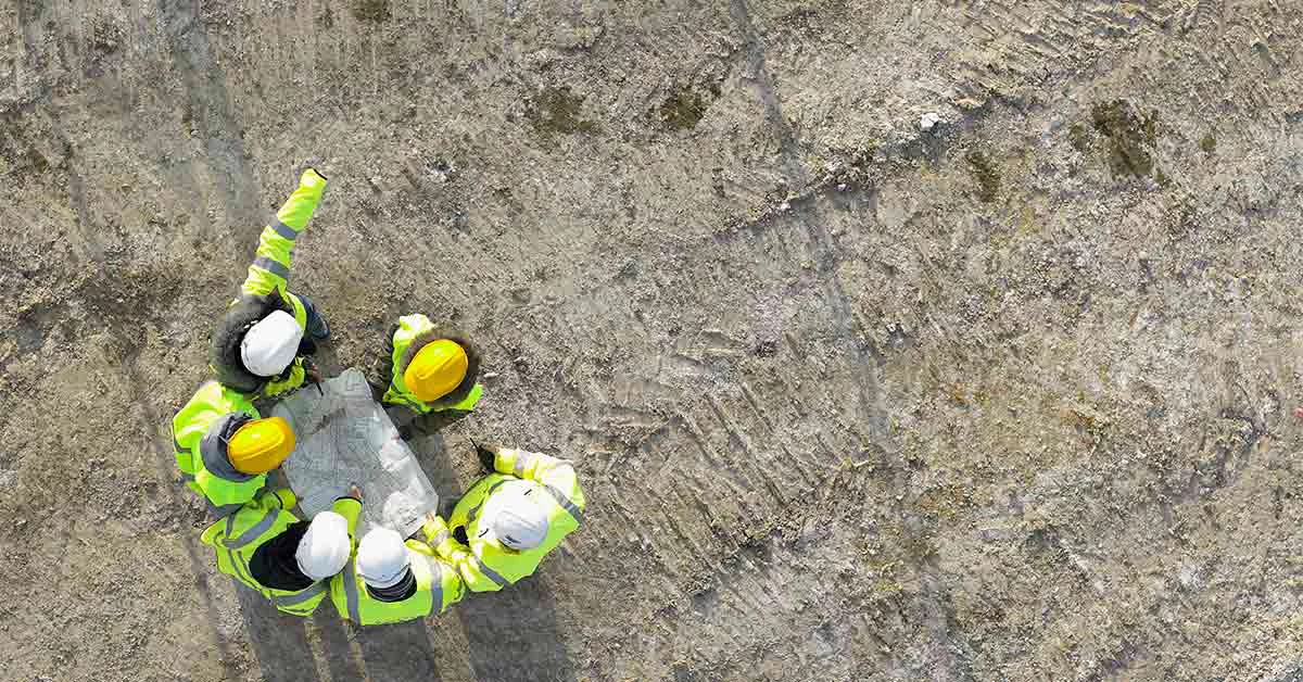 Three construction workers