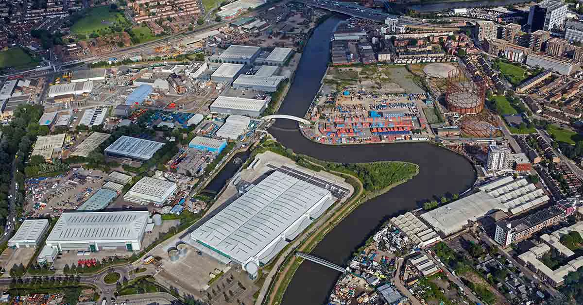 Elevated view of warehouses, factories and River Lea in the redeveloped East London area