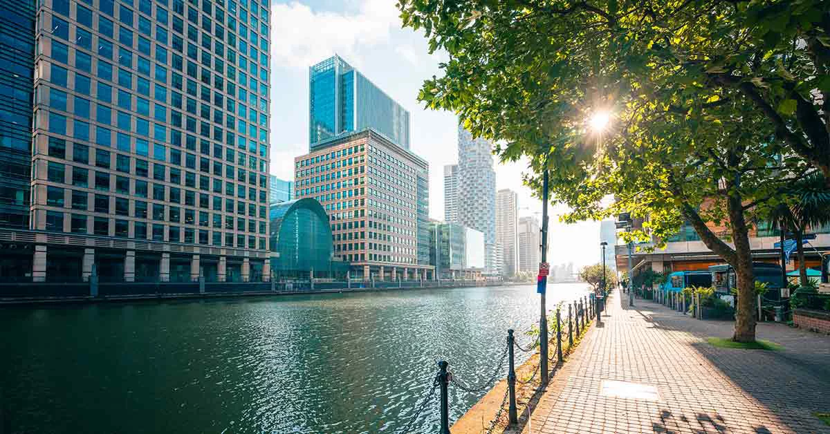 A city canal flanked by tall buildings