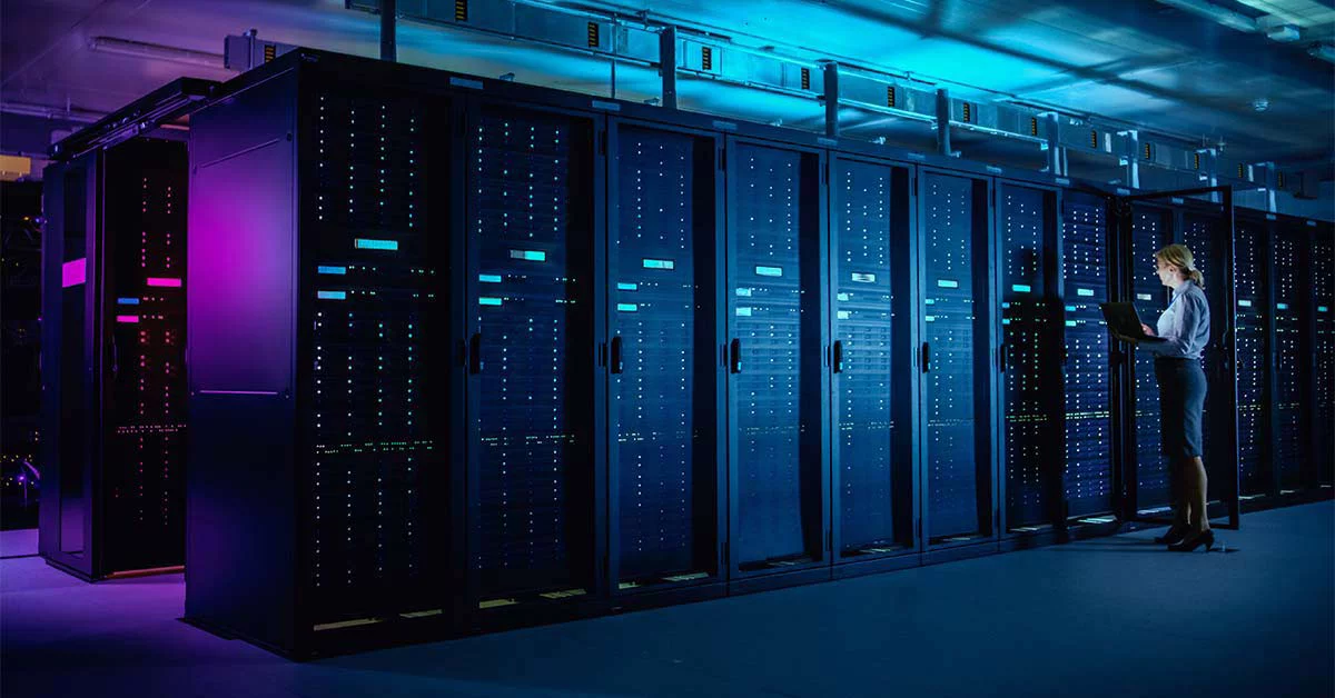 Woman checking and maintenance on servers