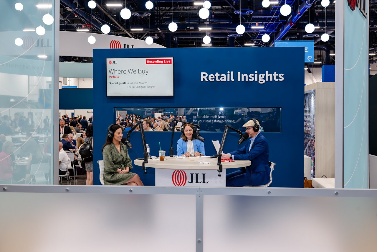 Three women discussing in jll podcast