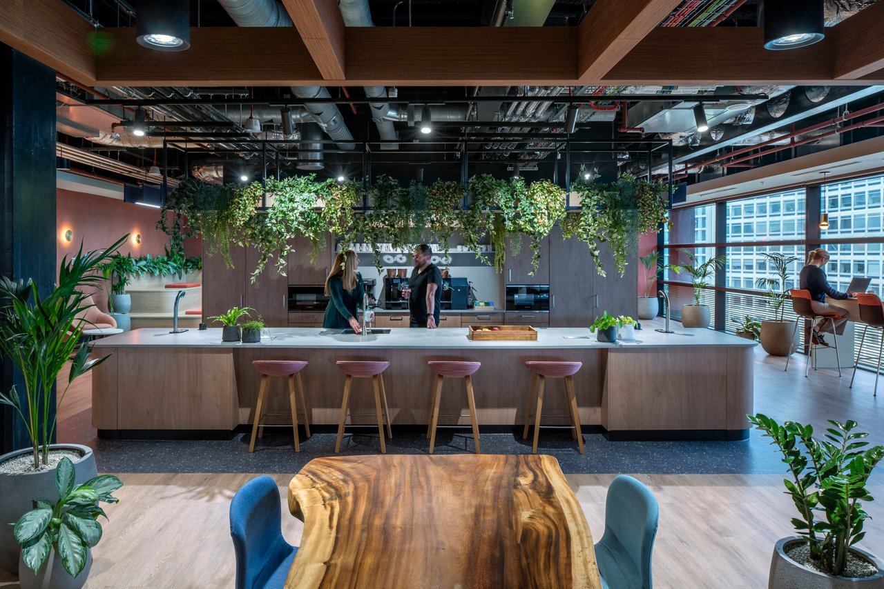The teapoint at JLL’s Birmingham office features a Durat worktop made from recycled post-industrial plastic waste, while the timber feature table is reused from the LaSalle London office