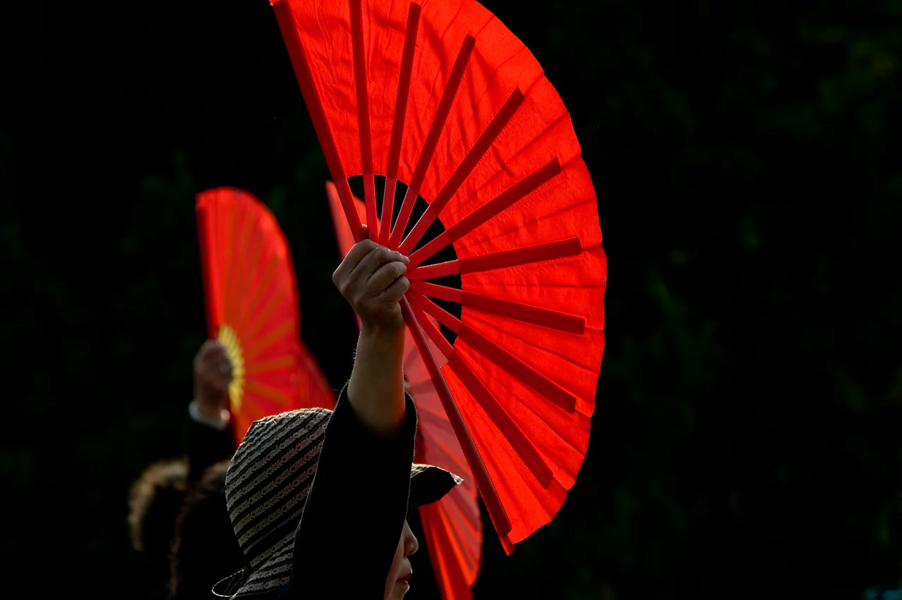 women with hand fan