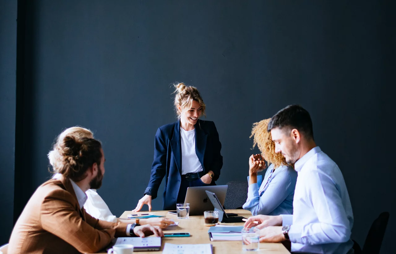 Group Of Happy Businesspeople On A Meeting At Their Company
