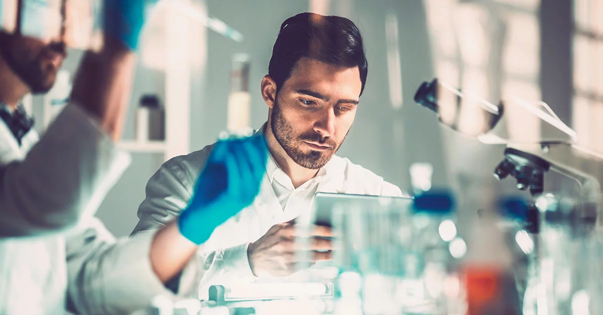Scientists working in laboratory