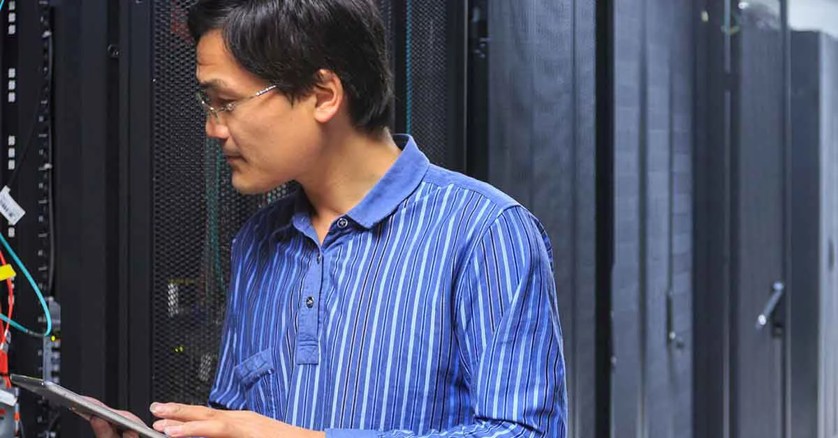 Man working in a server room