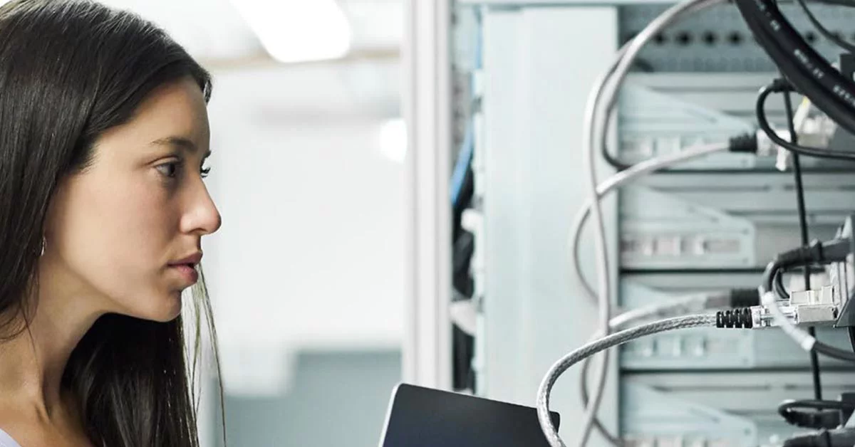 Professional woman operating a data centre