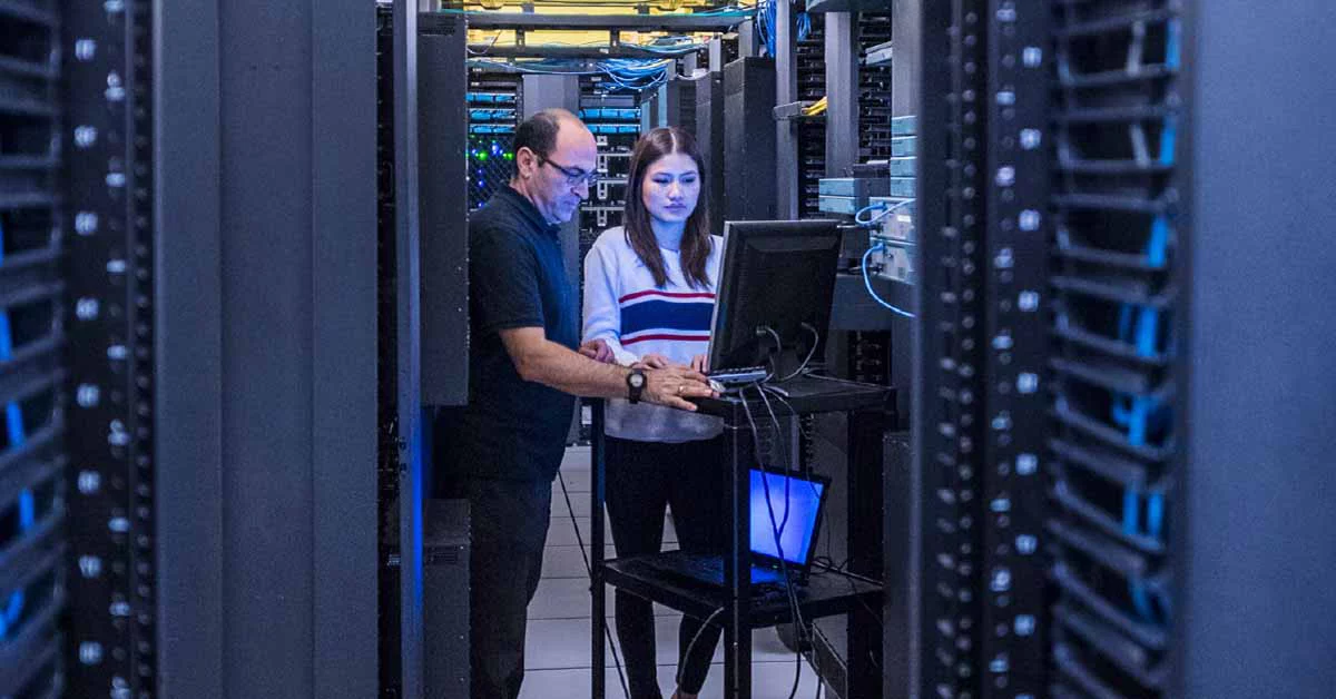 Two people working
