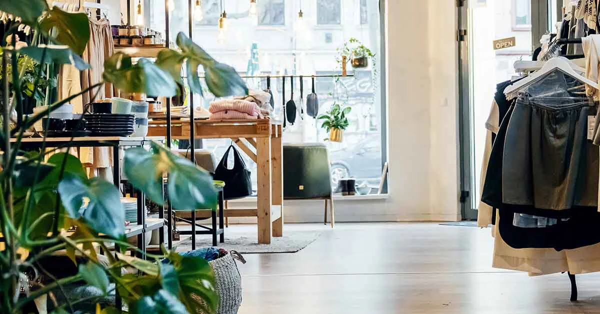 Fashionable clothing store with garments on display
