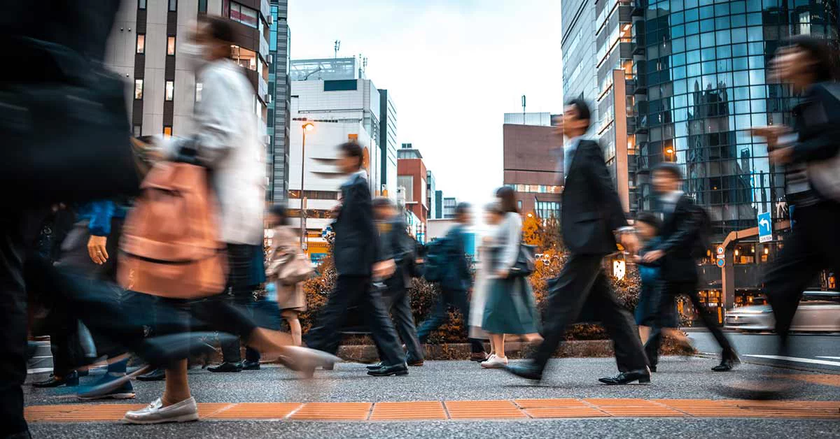 People going towards the office in a smart city