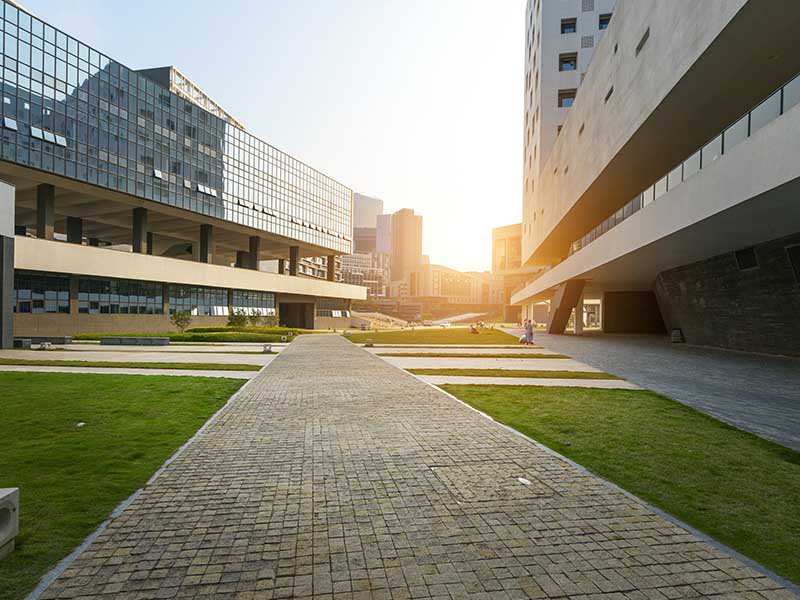 Modern commercial office complex with glass and concrete buildings