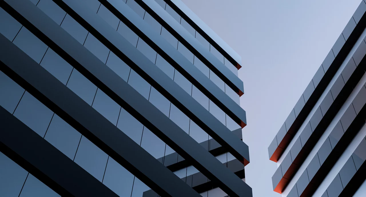 Los dos edificios modernos con ventanas de cristal.