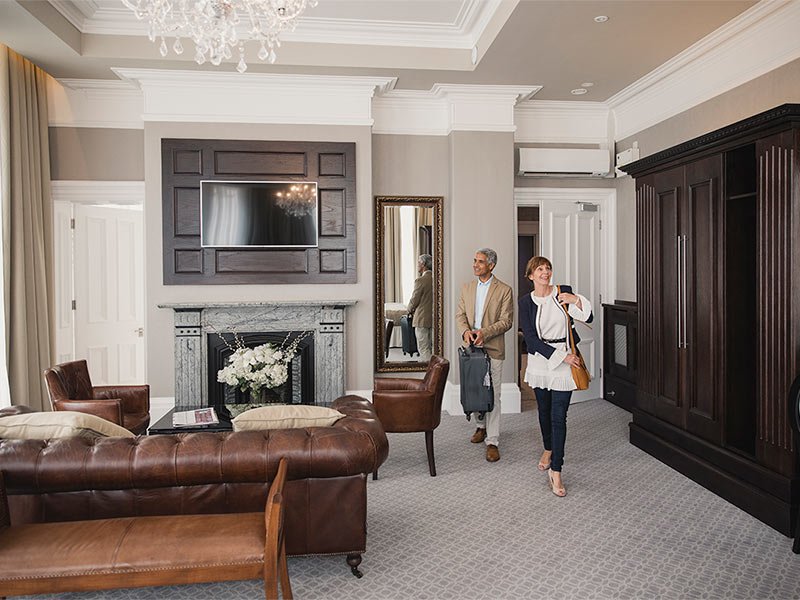 Mature woman has been surprised by her husband with a luxury hotel break