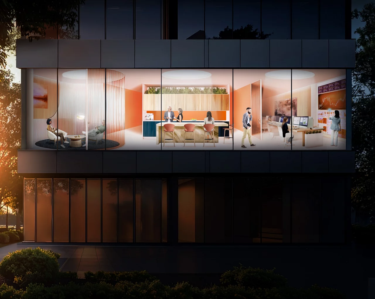 Modern glass office building exterior at night showing illuminated interior workspace with people working inside.