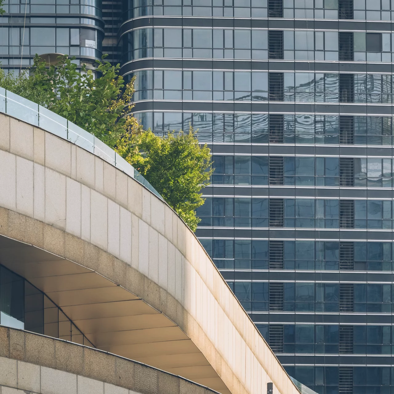 Contemporary glass building with roof garden,shanghai,china.