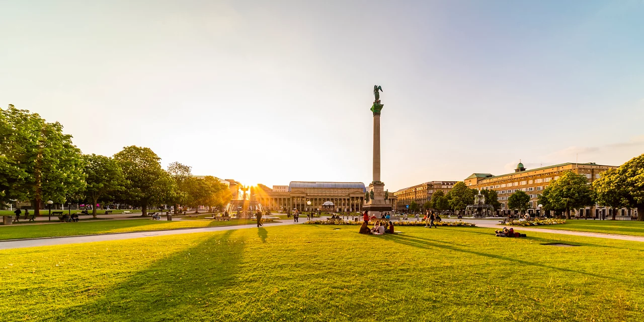 Germany, Baden-Wurttemberg, Stuttgart, Lawn in front of Schlossplatz at sunset