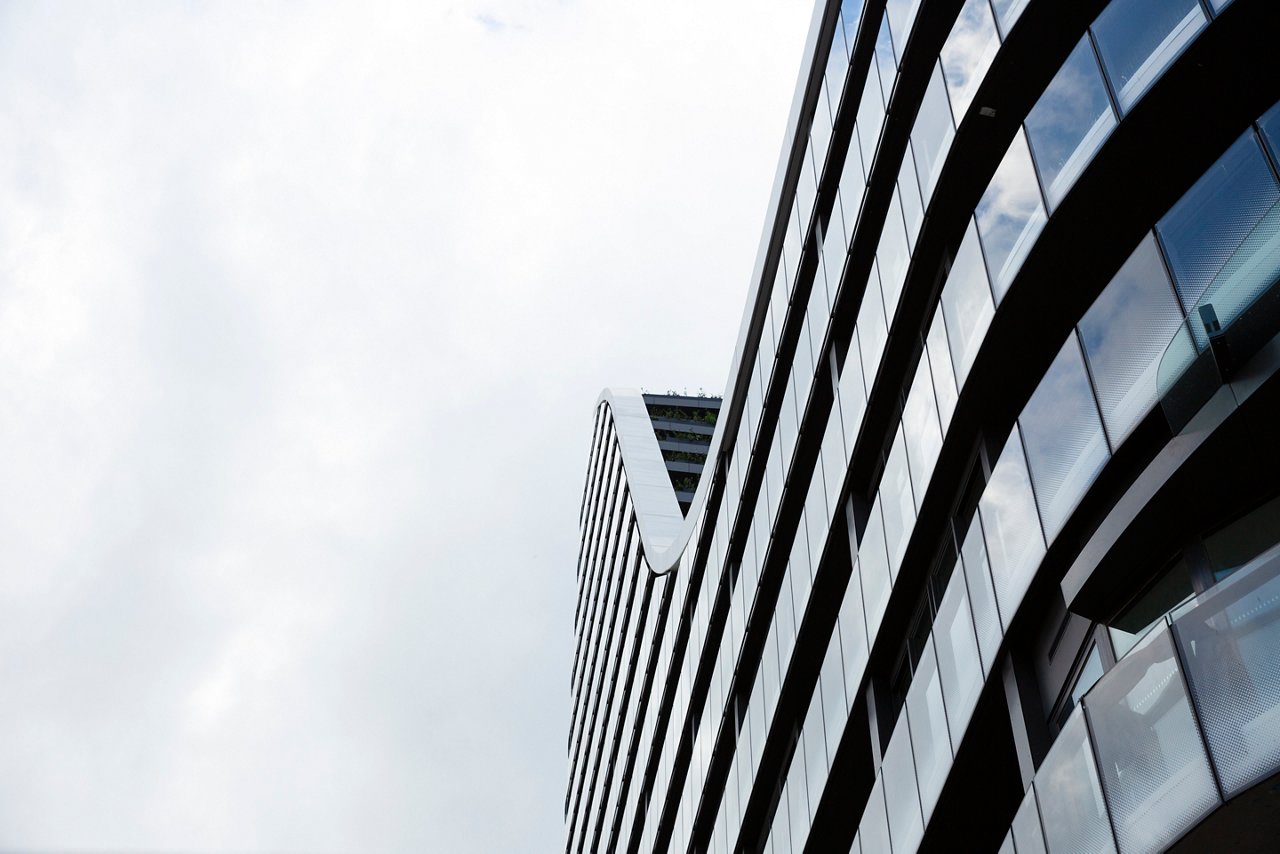 Low angle view of modern apartment building, Green Square, Sydney Australia, sky background with copy space, full frame horizontal composition