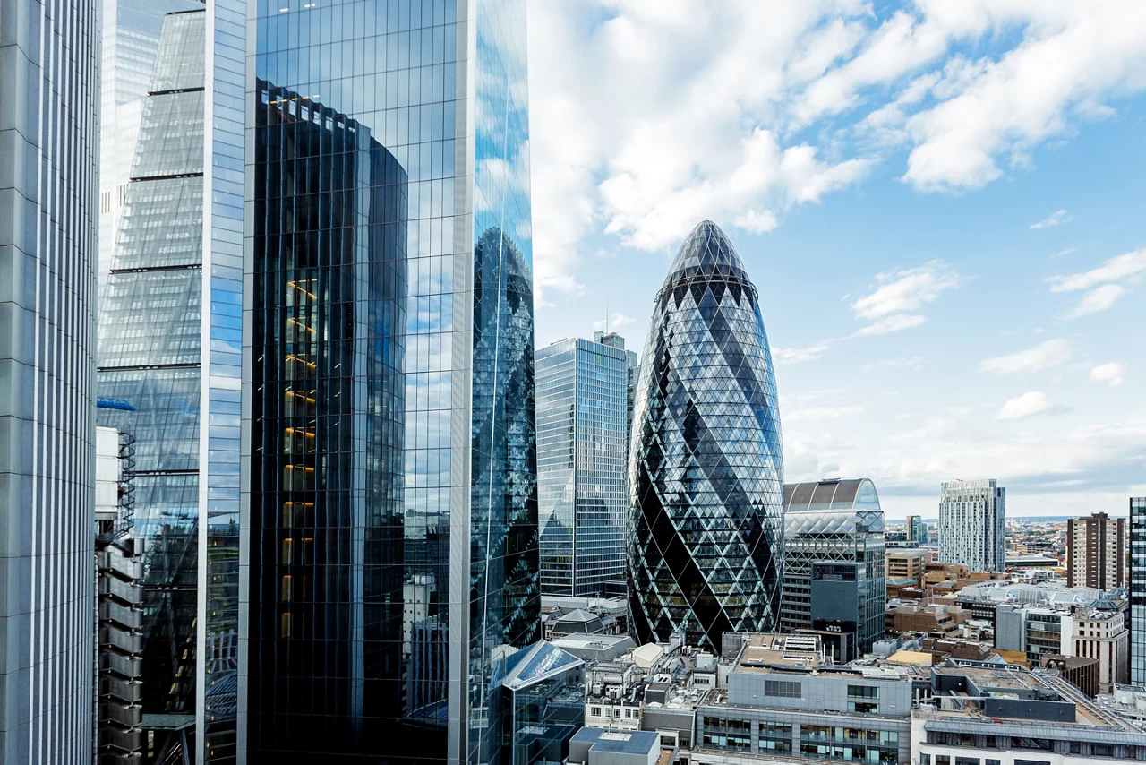 Tall buildings with mirrored glass in London