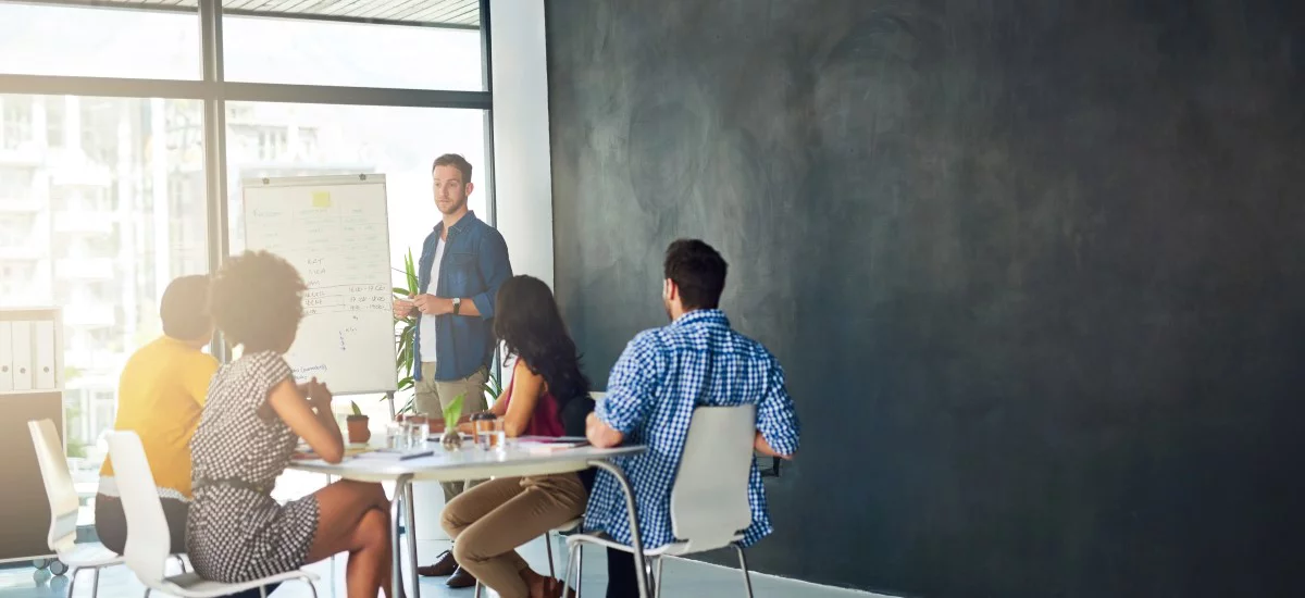 Shot of a businessman giving a presentation to his colleagues in a modern office
