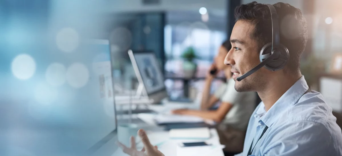 Crm, mockup or man in a telemarketing call center helping, talking or networking online via microphone.