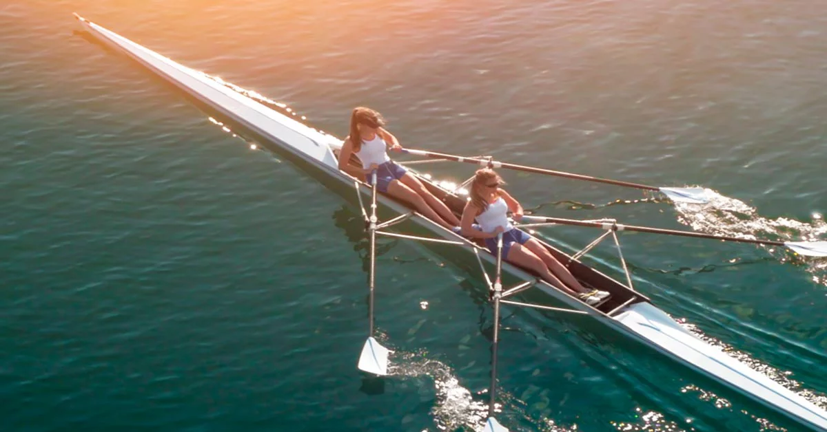 Two women rowing the boat