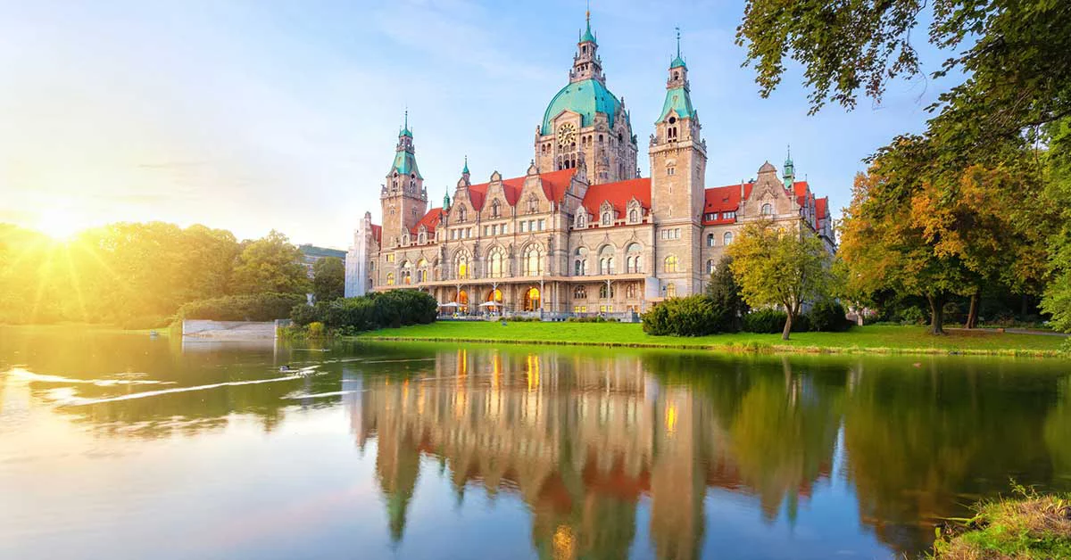 New Town Hall reflecting in water in Hanover, Germany