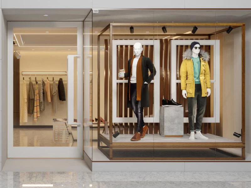 A retail store featuring a display case showcasing various clothing items for sale.
