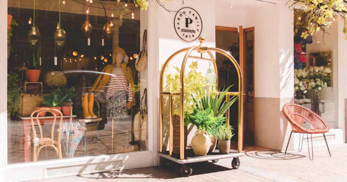 Plants are placed in front of a shop