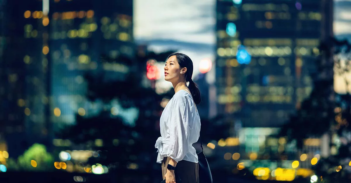 A woman standing in the road