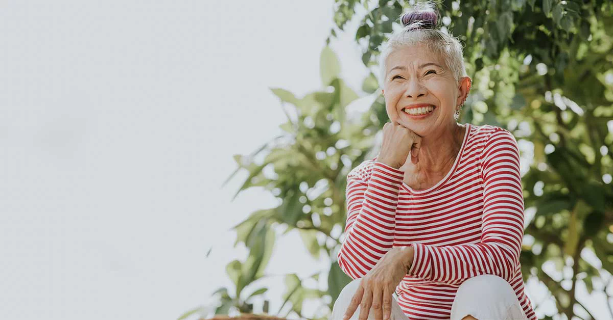 Portrait of smiling Asian senior woman
