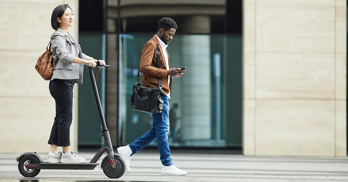People walking past an office building