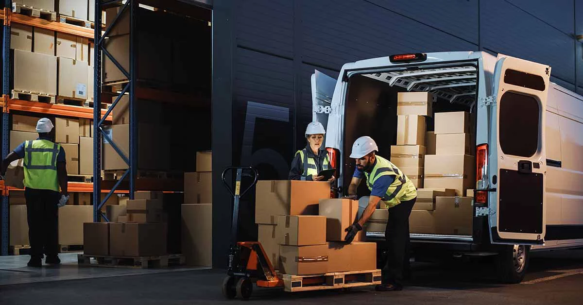 People loading a delivery van