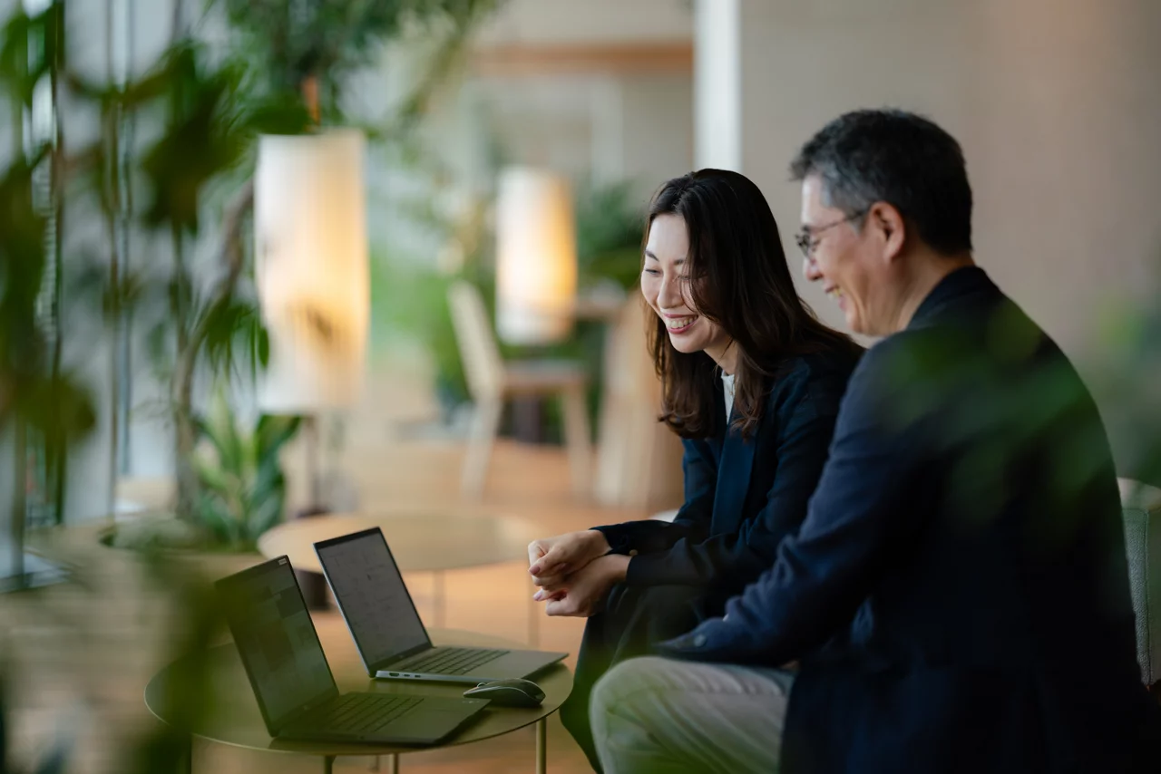 JLL employees converse at JLL Tokyo office on July 4, 2025 in Tokyo, Japan.