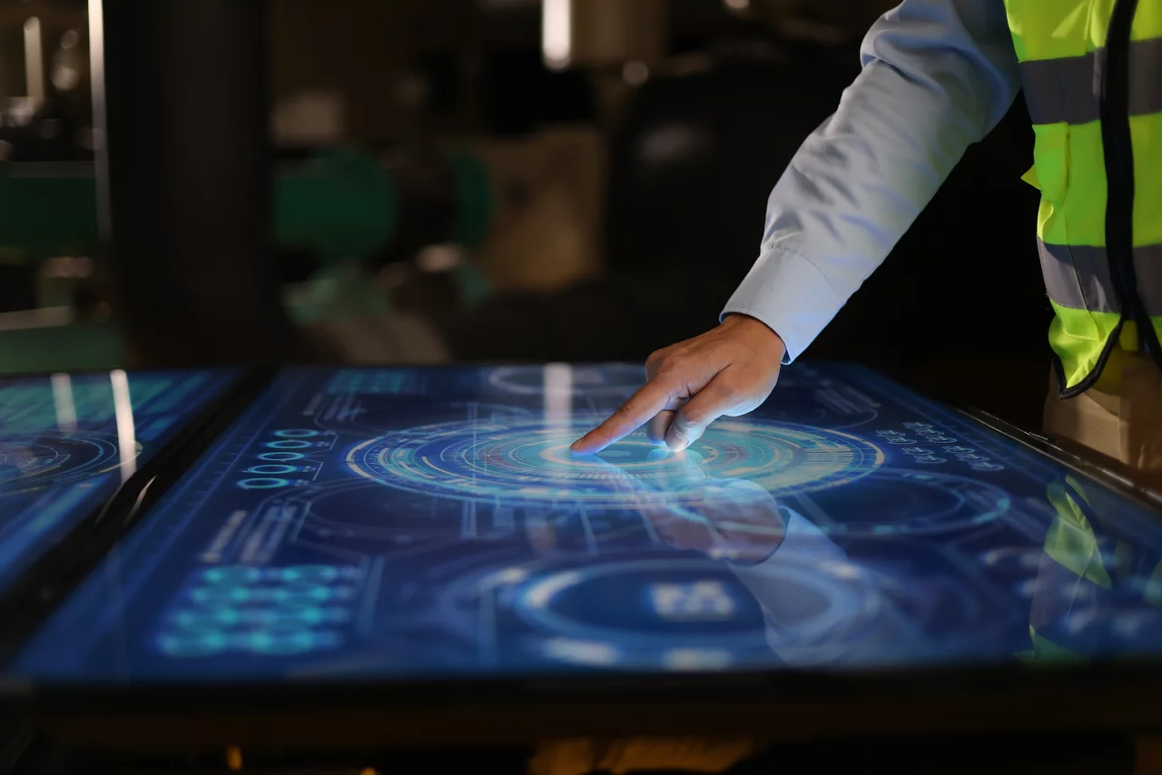 Close-up engineer hand Futuristic control panel