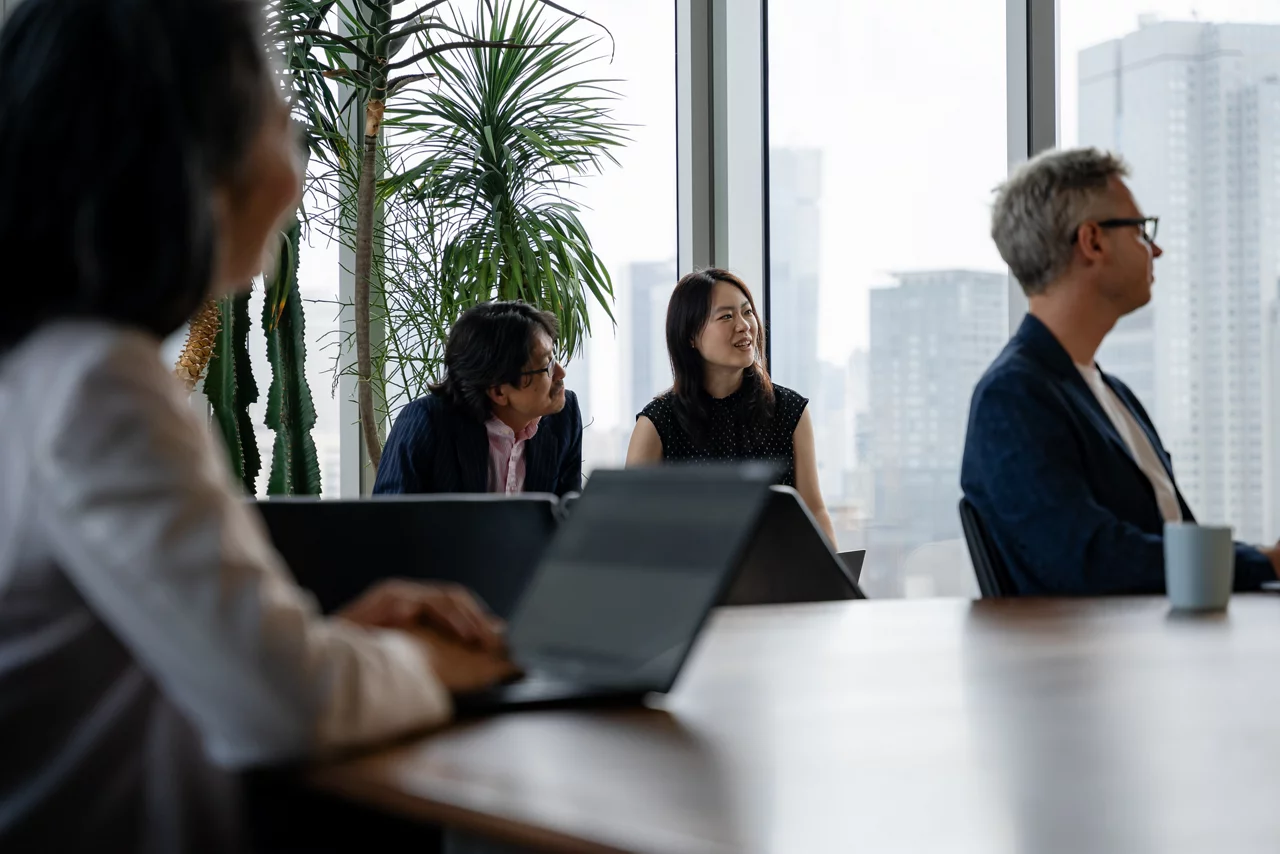 people having discussion in meeting room