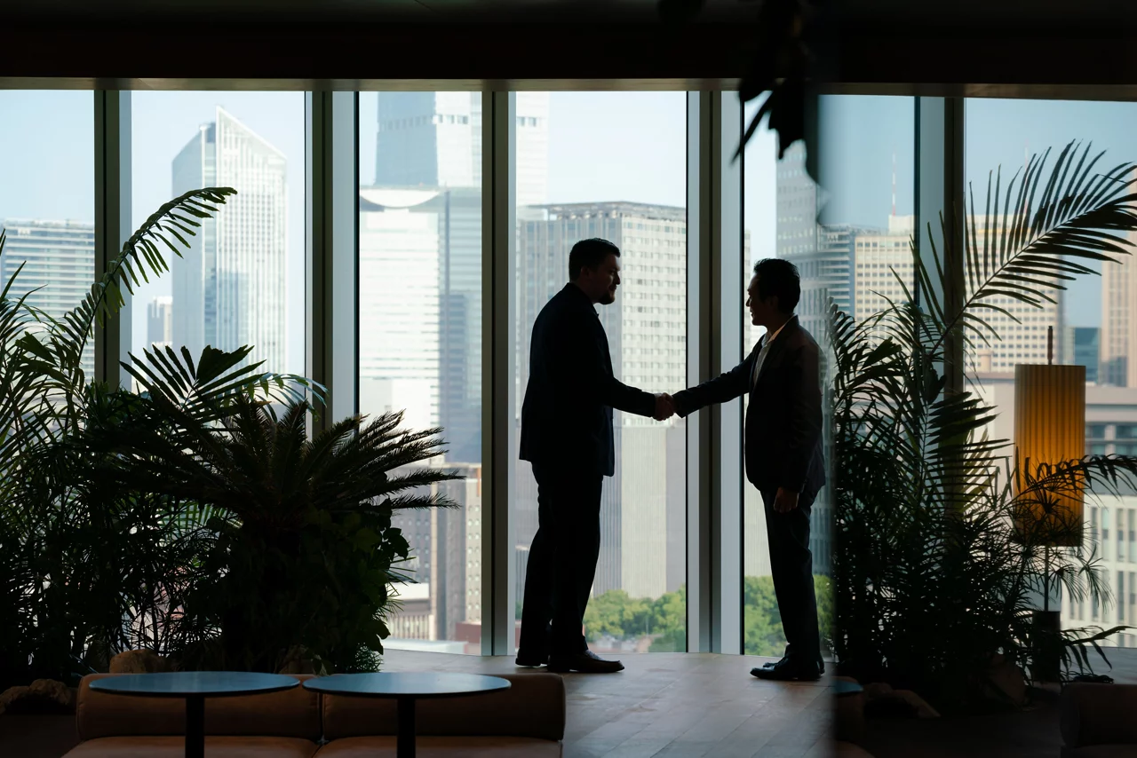 JLL employees congratulating each other