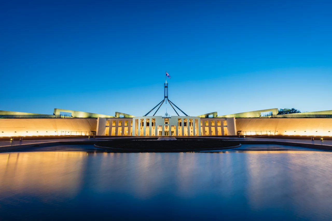 Australian Parliament House, the meeting place of the Parliament of Australia at night - twilight