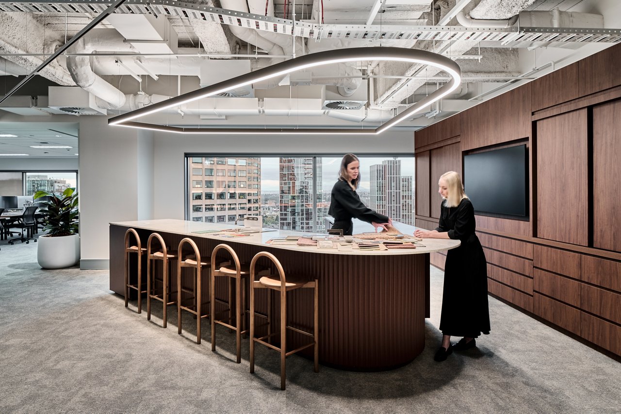 office professionals discussing in lobby