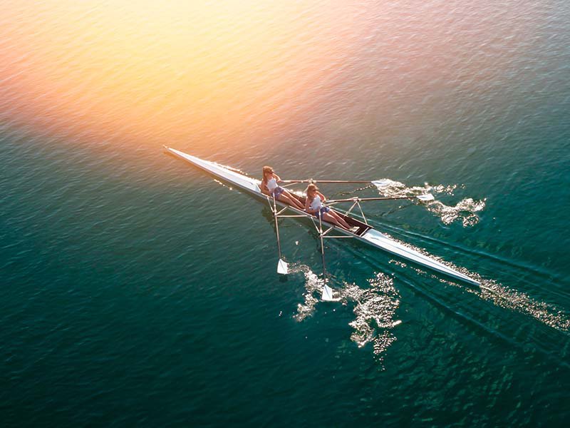 Women rowing in a boat