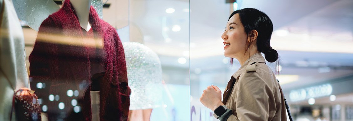 A girl looking at dress