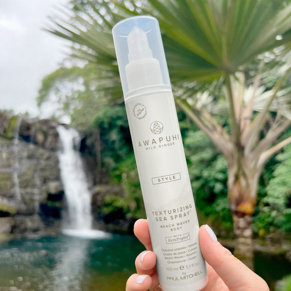 a bottle of Awapuhi Wild Ginger Texturizing Sea Spray