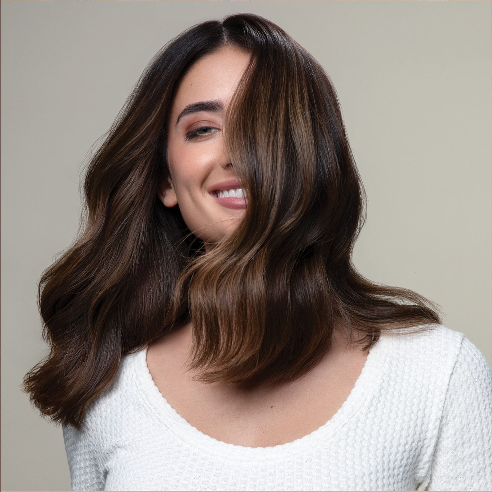 image of a woman with dark, chocolate hair