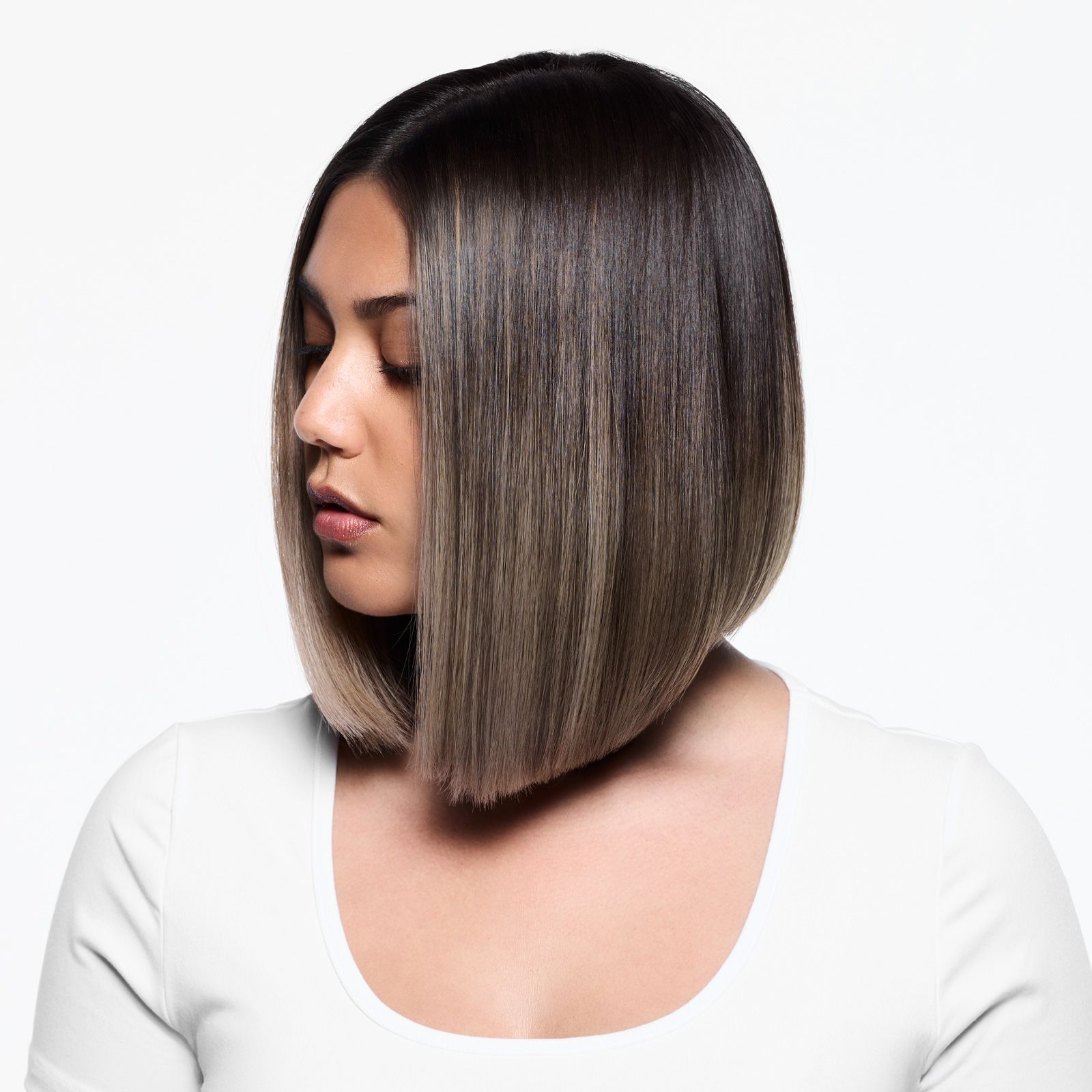 image of a woman with smoky, almond hair