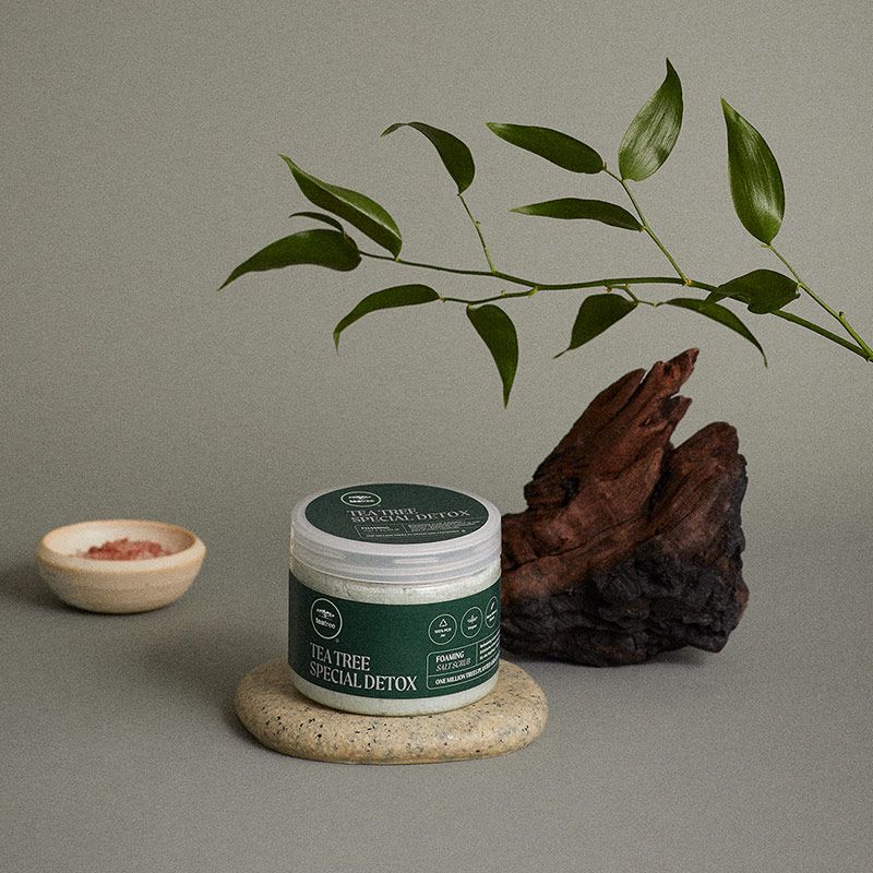 a puck of Tea Tree Special Detox Foaming Salt Scrub