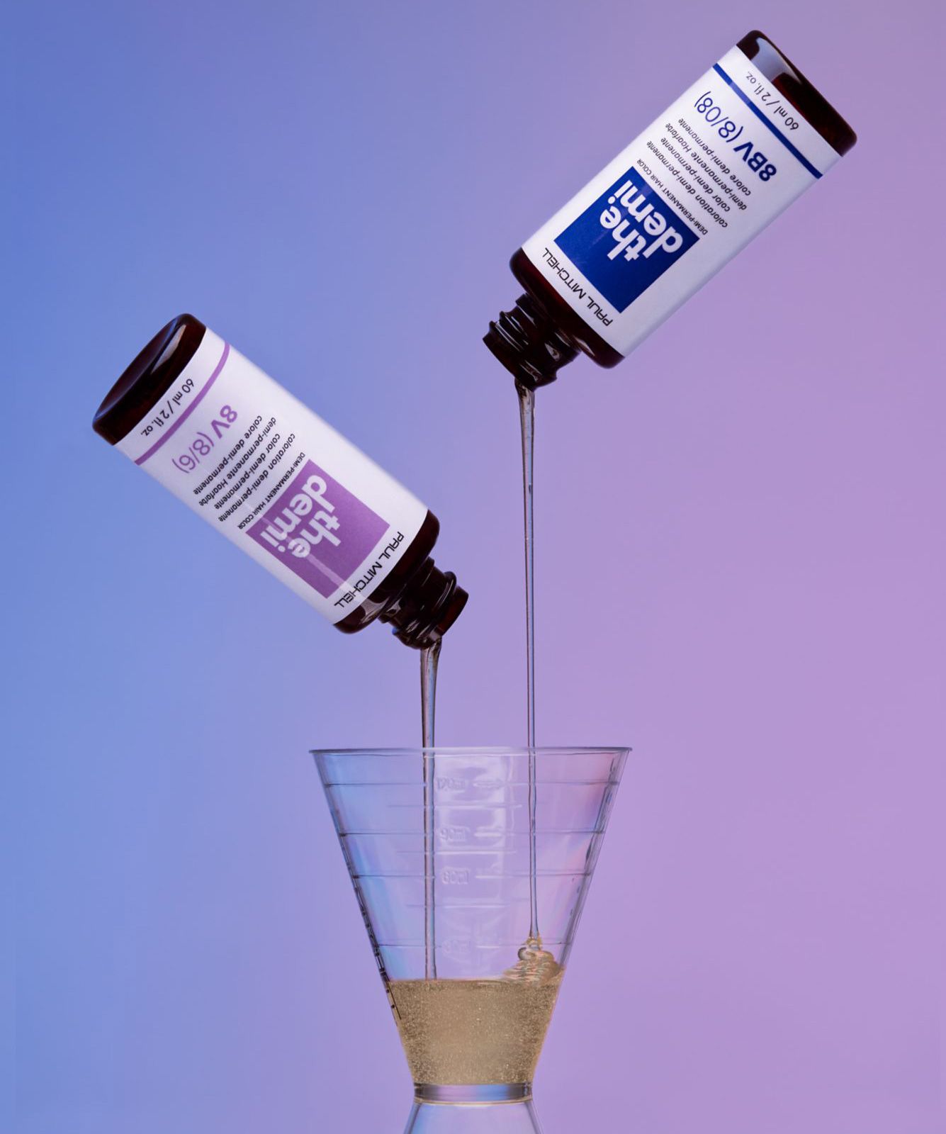 artistic image of The Demi 8BV and 8V poured into a measuring shot