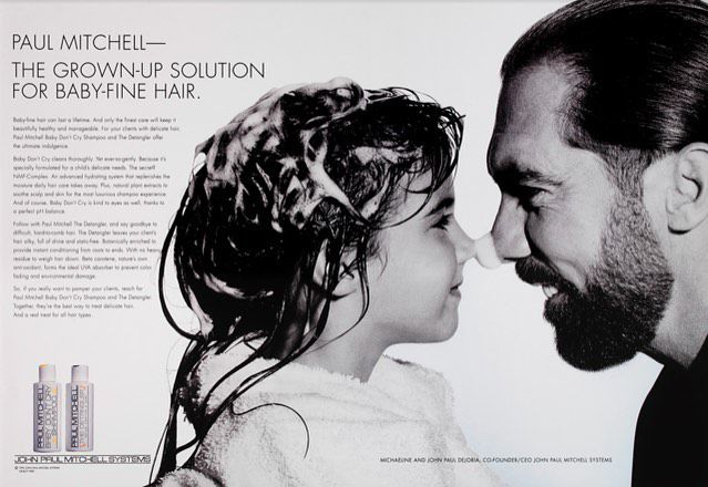image of a classic Paul Mitchell Kids ad featuring John Paul and Michaeline DeJoria